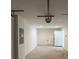 Spacious garage with white walls, concrete floor and garage door at 15433 Sw 47Th Avenue Rd, Ocala, FL 34473
