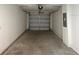 View of empty single car garage at 15433 Sw 47Th Avenue Rd, Ocala, FL 34473