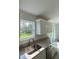 Kitchen featuring granite countertops and stainless steel sink at 15433 Sw 47Th Avenue Rd, Ocala, FL 34473