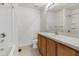 The bathroom features a single sink vanity and a shower-tub combination at 4426 Sw 49Th Ave, Ocala, FL 34474