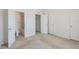 An airy primary bedroom showing an ensuite bathroom and multiple closets at 4426 Sw 49Th Ave, Ocala, FL 34474
