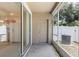 Enclosed patio with access to the kitchen, offering a seamless transition between indoor and outdoor spaces at 4426 Sw 49Th Ave, Ocala, FL 34474