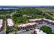 Beautiful aerial view of condominium property with landscaping and serene lake views at 220 La Casa # 220, Lake Wales, FL 33898