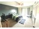 Bedroom featuring stylish dark accent wall and large closet with sliding door at 220 La Casa # 220, Lake Wales, FL 33898