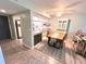 Dining room is open to the kitchen with stylish counter and cabinetry at 220 La Casa # 220, Lake Wales, FL 33898