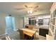 Dining room with views of the kitchen featuring bar seating at 220 La Casa # 220, Lake Wales, FL 33898