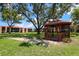 Charming community gazebo, surrounded by lush green lawns, offering a tranquil outdoor space at 220 La Casa # 220, Lake Wales, FL 33898