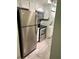 Modern kitchen showcasing stainless steel appliances and tiled flooring at 220 La Casa # 220, Lake Wales, FL 33898