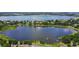 Breathtaking aerial photo of lake and lush trees for a tranquil community view at 220 La Casa # 220, Lake Wales, FL 33898