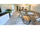 Comfortable living room featuring stylish decor and an open layout to the kitchen at 220 La Casa # 220, Lake Wales, FL 33898