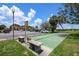 Community shuffleboard courts in a lush park-like setting near ample parking at 220 La Casa # 220, Lake Wales, FL 33898