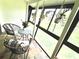 Bright sunroom featuring tile floor and many windows allowing for lots of sunlight at 220 La Casa # 220, Lake Wales, FL 33898