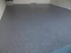 Garage with epoxy coated flooring at 231 Lake Suzanne Dr, Lake Wales, FL 33859