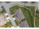 Aerial view shows a neighborhood's landscaped streets and lush lawns at 3017 Mission Lakes Dr, Lakeland, FL 33803