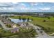 Aerial view of houses in a suburban community with nearby water features at 3017 Mission Lakes Dr, Lakeland, FL 33803