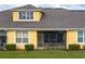 Sunny exterior view of home showcasing a cozy screened-in porch at 3017 Mission Lakes Dr, Lakeland, FL 33803