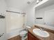 Standard bathroom featuring a shower-tub combo with a single-sink vanity at 1029 Evans Loop, Lake Wales, FL 33853