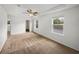 Bedroom featuring neutral walls, carpeted floors, ceiling fan and bright windows at 1029 Evans Loop, Lake Wales, FL 33853