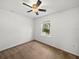 Bedroom featuring neutral walls, carpeted floors, and a window at 1029 Evans Loop, Lake Wales, FL 33853