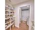 Well-organized pantry with ample shelving for food storage at 112 Reedy Creek Dr, Frostproof, FL 33843