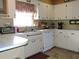 Bright kitchen features ample cabinetry and updated appliances at 1163 Cephia St, Lake Wales, FL 33853