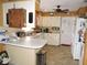 Efficient kitchen featuring white cabinets and ample counter space at 1163 Cephia St, Lake Wales, FL 33853