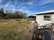 Spacious backyard with trampoline and shed at 2000 Mcclellan Rd, Frostproof, FL 33843