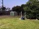 Backyard with shed and large bushes at 2000 Mcclellan Rd, Frostproof, FL 33843