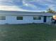 Ranch home with blue door and new windows at 2000 Mcclellan Rd, Frostproof, FL 33843