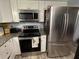 Modern kitchen with stainless steel appliances at 2000 Mcclellan Rd, Frostproof, FL 33843