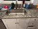 Kitchen features a large stainless steel sink at 2000 Mcclellan Rd, Frostproof, FL 33843