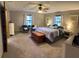 Large main bedroom with comfortable sitting area and plenty of natural light at 2153 Capps Rd, Lake Wales, FL 33898