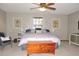 Main bedroom with two windows, a ceiling fan, and ample space at 2153 Capps Rd, Lake Wales, FL 33898