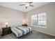 Bright bedroom with a bed and window with blinds at 3020 Caneel St, Winter Haven, FL 33884