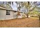 Large backyard with shed and mature trees at 337 Swingle St, Frostproof, FL 33843