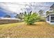 View of backyard with wooden fence at 337 Swingle St, Frostproof, FL 33843