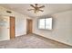 Bedroom featuring carpet, ceiling fan, and window at 337 Swingle St, Frostproof, FL 33843