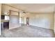 Spacious living room with neutral carpeting and ceiling fan at 337 Swingle St, Frostproof, FL 33843