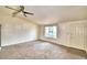 Living room with new flooring and a view of the front yard at 337 Swingle St, Frostproof, FL 33843