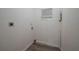 Small laundry room with vinyl flooring and hookups for washer and dryer at 412 2Nd Sw St, Winter Haven, FL 33880