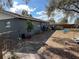 Backyard view of a home with a partially fenced area at 4718 Cynthia St, Bartow, FL 33830