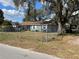 Ranch home with a fenced yard and street view at 4718 Cynthia St, Bartow, FL 33830