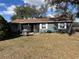 Ranch-style home with fenced yard and mature trees at 4718 Cynthia St, Bartow, FL 33830