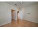 Spacious bedroom with tile flooring, ceiling fan, and multiple doorways at 5011 Hemingway Cir # 5011, Haines City, FL 33844