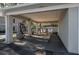 Community carport with ample space for parking and convenient car washing facility at 5011 Hemingway Cir # 5011, Haines City, FL 33844