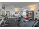 Well-equipped community gym featuring modern exercise machines, weights, and fitness accessories at 5011 Hemingway Cir # 5011, Haines City, FL 33844