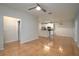 Open living space showcases tile flooring connecting the living room to the kitchen at 5011 Hemingway Cir # 5011, Haines City, FL 33844