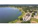 Breathtaking aerial view of a waterfront community with beautiful lake, parks, and tree-lined streets at 711 Springer Dr # 2, Lake Wales, FL 33853