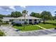 Well-maintained condominium complex featuring lush landscaping, ample parking, and serene surroundings at 711 Springer Dr # 2, Lake Wales, FL 33853