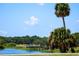 Scenic view of the lake and a pier; a wonderful spot to relax and enjoy the outdoors at 711 Springer Dr # 2, Lake Wales, FL 33853